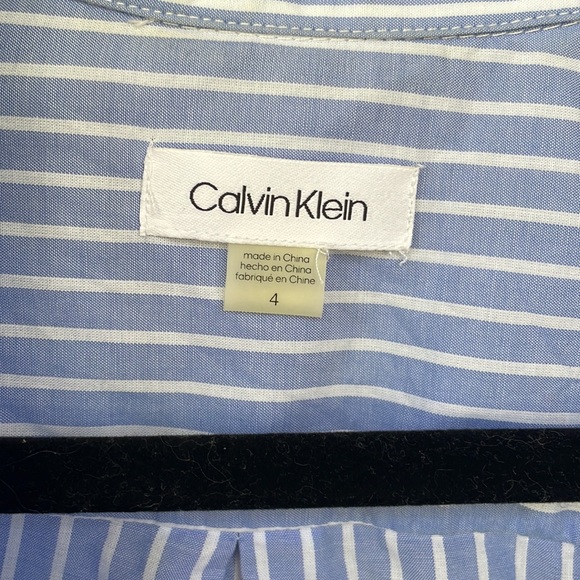 Calvin Klein button down dress with tie in front. Size is a 04. - Picture 2 of 4